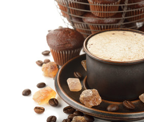 Cup of coffee and chocolate muffins