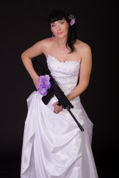beautiful bride with gun
