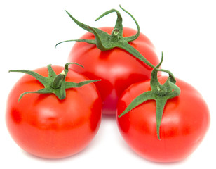 ripe tomatoes on a white background