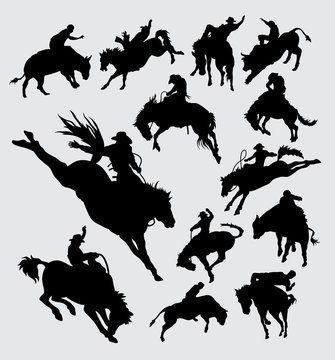 Rodeo cowboy riding animal silhouettes
