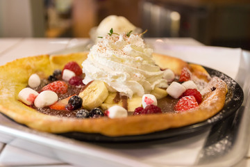 pancake topping with red fruit