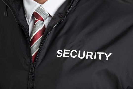 Security Guard Wearing Uniform With The Text Security