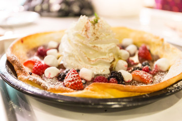 pancake topping with red fruit