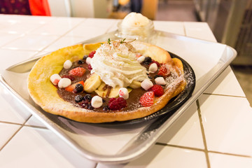 pancake topping with red fruit