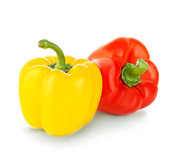 Sweet yellow, red peppers isolated on white background.