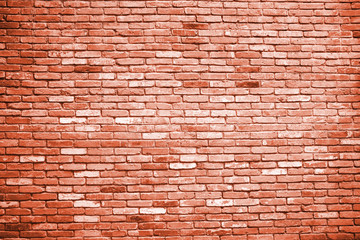 Fototapeta na wymiar Orange brick wall with diminishing perspective