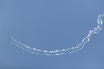 Show of airplanes creating smoke trails