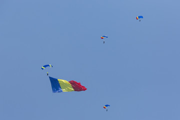 Paraglider flying in summer day