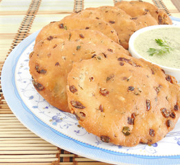 Maddur vada, an Indian deep fried snack, which is typically eaten with coconut chutney.