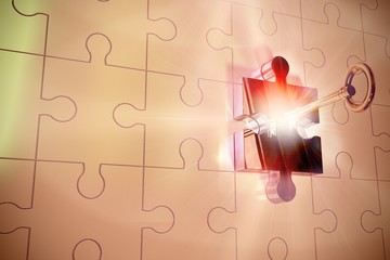 Key unlocking jigsaw