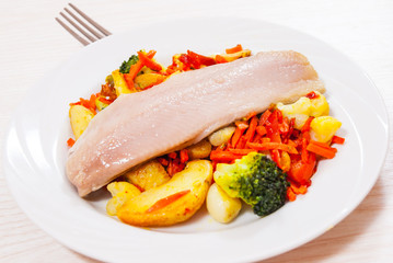 Fillet of fish with vegetables