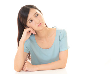 Fototapeta premium 疲れた表情の女性