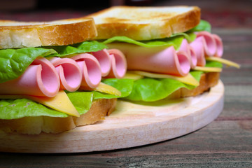 sandwich with ham, cheese and lettuce