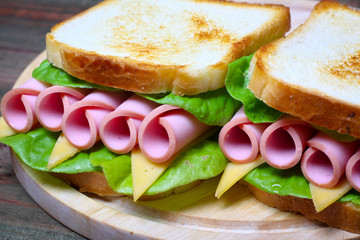 sandwich with ham, cheese and lettuce