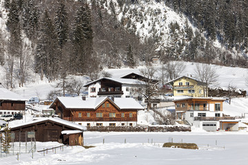 Fototapeta na wymiar Alpine village in the snow