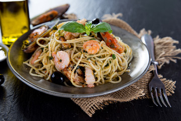 Italian pasta aglio olio with sea fruit