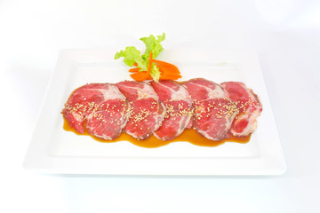 freshness slided pork on white dish for grill