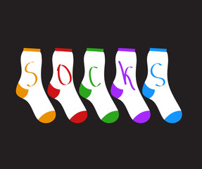 cotton socks of different colors on a black background