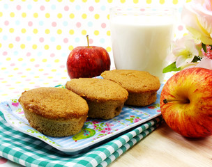 egg cake coffee flavor and red apple on sweet polka dot background