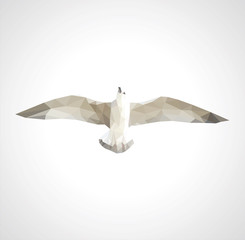 Obraz premium polygonal seagull in flight on a white background
