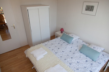Interior of arranged double bed in a room