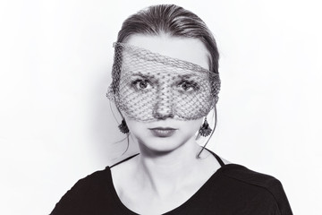 Young beautiful woman in the veil