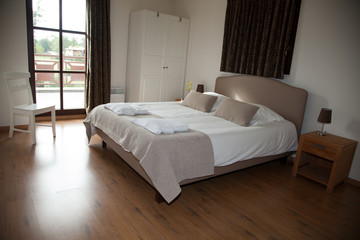 Interior of arranged double bed in a room