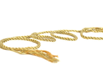 Golden rope isolated on white background