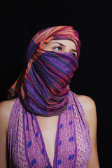 Portrait of beautiful green-eyed woman in hijab