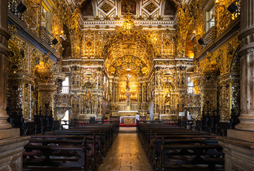 Fototapeta premium Brazil, Salvador, statues of saints and gold decorations in the St. Francisco church