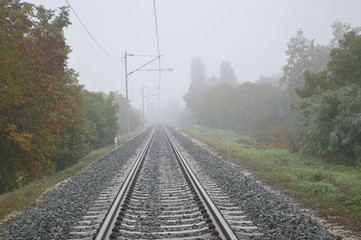 Fototapeta na wymiar Railway track line in mist