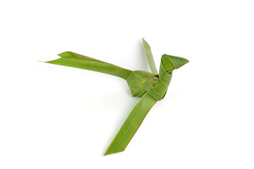 bird made of coconut leaves on white background