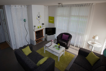 Modern, bright, clean, living room   in a  house