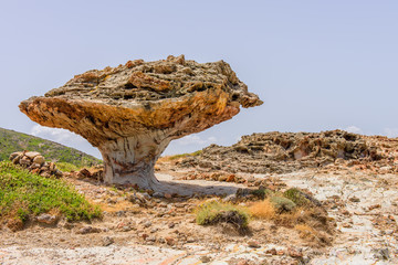 Skiadi stone - a giant lump in the shape of a mushroom, a unique natural attraction of the island of Kimolos, Cyclades, Greece.