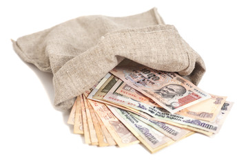 Money bag with Indian Currency Rupee bank notes