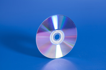 Compact disk on blue background