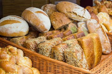 Freshly baked traditional loaves of rye bread on stall