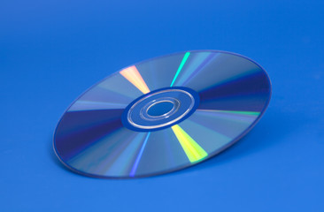 Compact disk on blue background