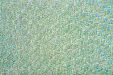 Background texture with old green textile.