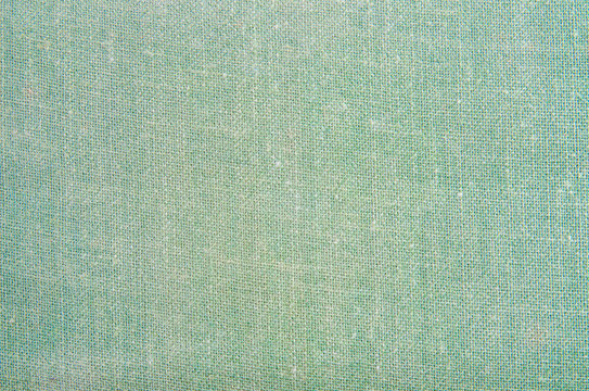 Background texture with old green textile.