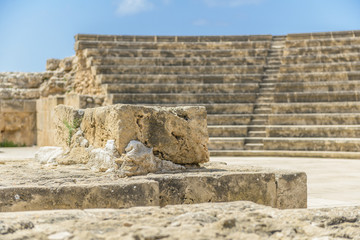 Ancient stone amphitheater ruins in Paphos, Cyprus.