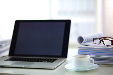 office desk a stack of computer paper reports work forms