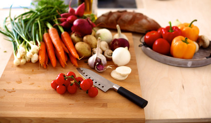 Fresh organic ofoschi on a wooden table ready to cook