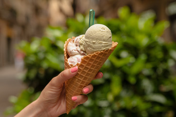 Ice cream cone in hand