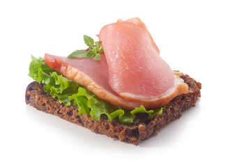 Sandwich with pork balyk, rye bread and lettuce