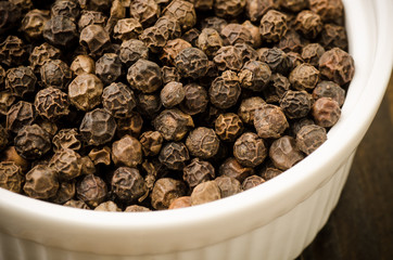 Black pepper in the bowl,food seasoning,spices