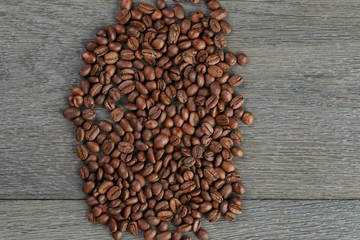 coffee beans border on old oak table