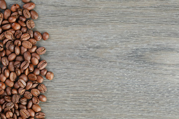coffee beans border on old oak table