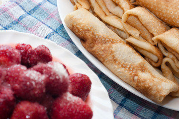 Delicious pancakes with strawberries