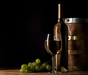 White wine on wooden background